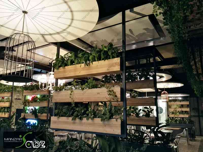 عکسی از پروژه خانه سام پاسداران (دکوراسیون و تراس سبز) در نمایش گیاهان داخل پروژه